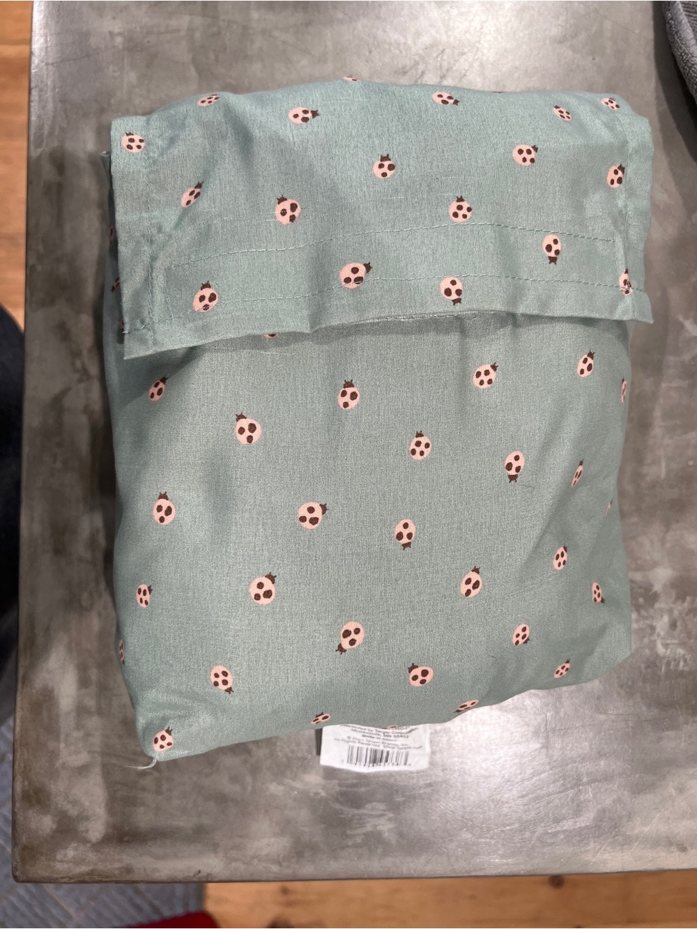 Pillowfort Twin sheet set in Sage Green with Pink ladybugs